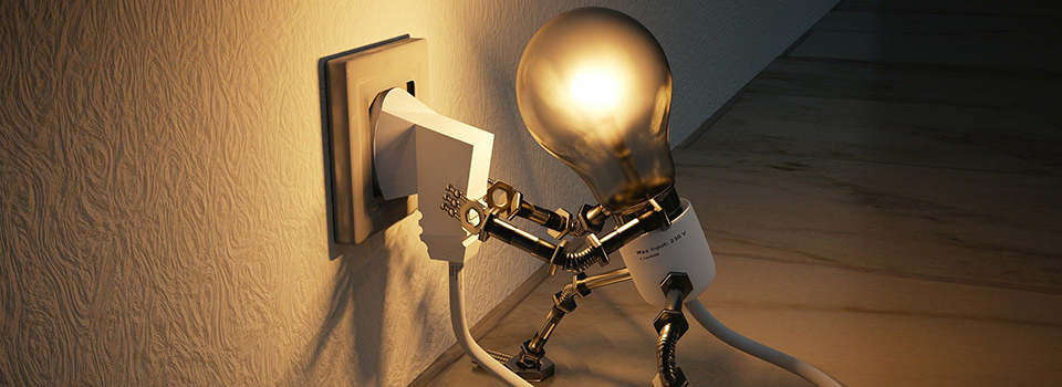 Bild på en glödlampa som ser ut som en robot